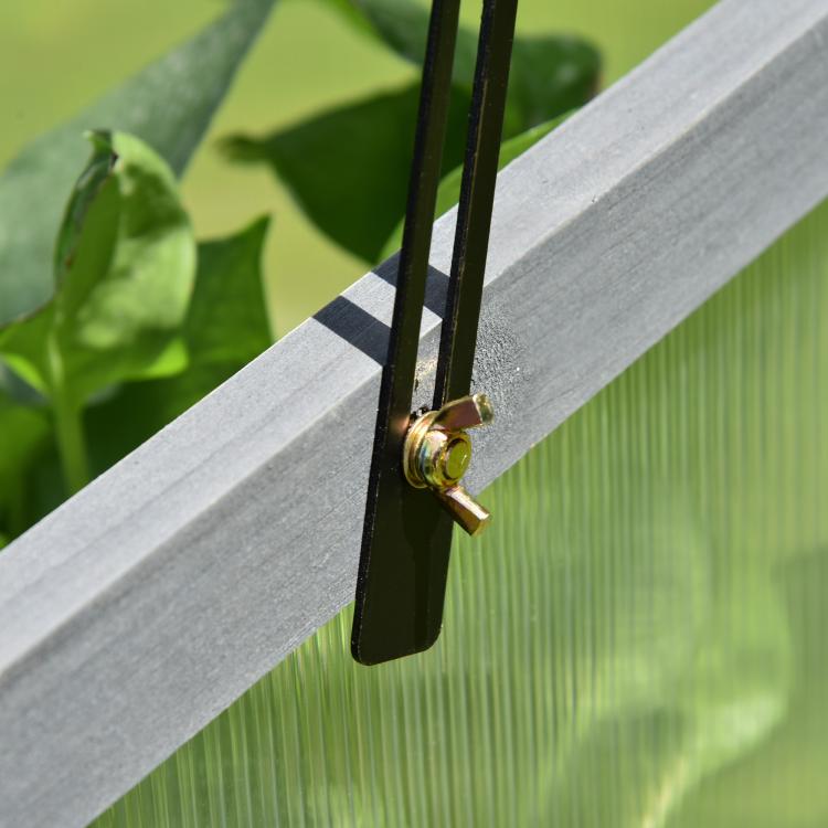 Gray greenhouse lid latch with hinge hardware and clear polycarbonate panel