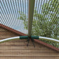 Galvanized steel crop cage base with curved frame and mesh sidewalls