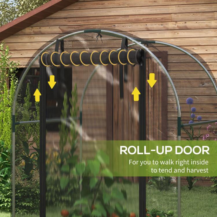 Black roll-up door on galvanized plant protection tent with arched mesh frame