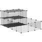 Black metal pet playpen with door, wire mesh walls, and raised platforms