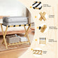 Bamboo luggage rack with black straps and round-corner design, holding a silver suitcase