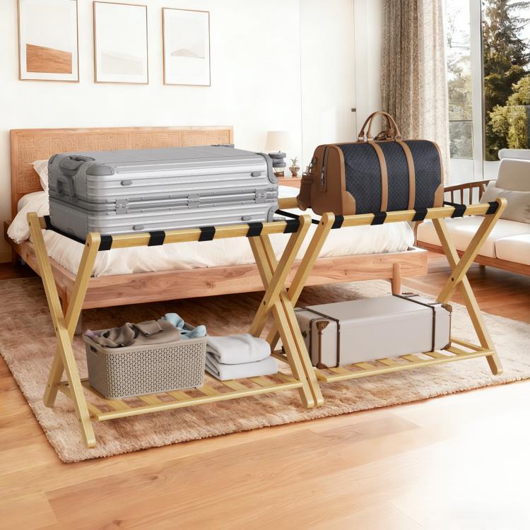 Bamboo luggage rack with black straps, holding a gray suitcase and a brown duffel bag