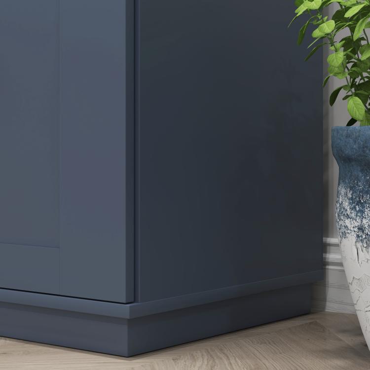 Freestanding navy pantry cabinet side view with base and tall cabinet panel