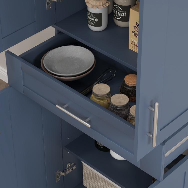Navy blue pantry cabinet drawer open with kitchen containers and stacked cookware