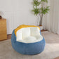 Oversized bean bag chair with blue faux fur and white inner cushion, yellow accent