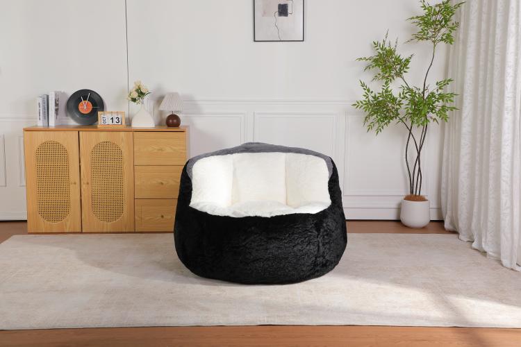 Black and white faux fur oversized bean bag chair with cushioned seat