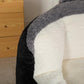 Bean bag chair armrest corner in black faux fur with white interior cushion