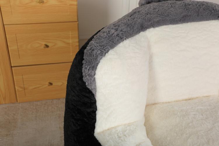 Bean bag chair armrest corner in black faux fur with white interior cushion