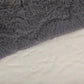 Gray plush faux fur top cushion of bean bag chair with white inner padding