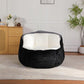 Black faux fur bean bag chair with white inner seat, angled view from front-left