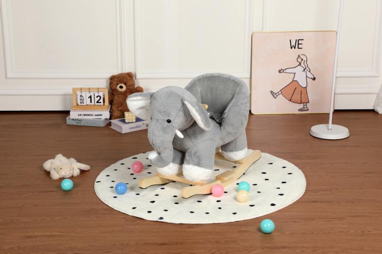 Grey plush elephant rocker with wooden runners and round play mat with balls