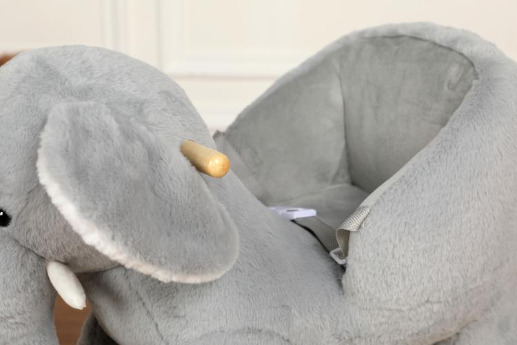 Grey plush elephant head and ears with soft textured details