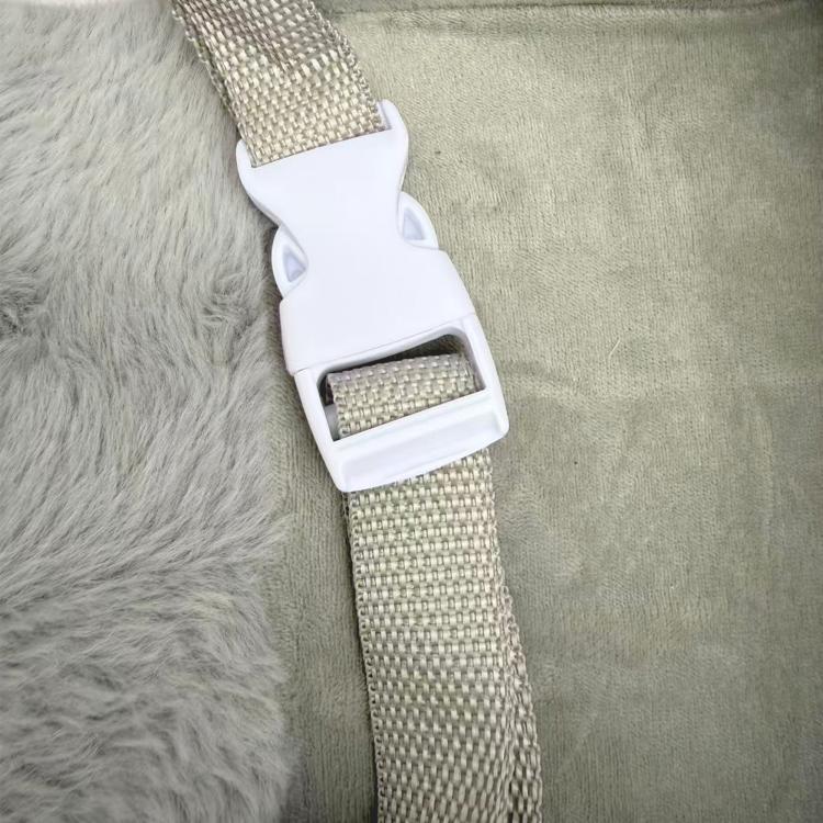 Adjustable white safety belt with grey woven strap on plush elephant rocker