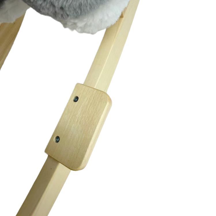 Wooden rocking base legs with screw details on plush elephant toy