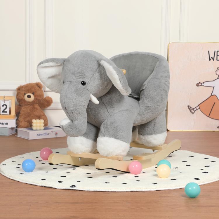 Grey plush elephant rocking toy with wooden rocker base and padded seat
