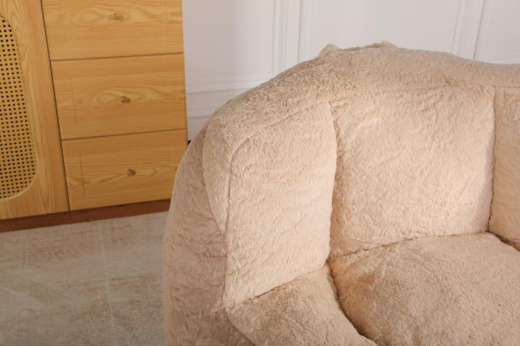 Oversized faux fur bean bag chair, tan curved back and armrest