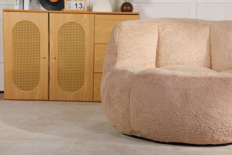 Oversized faux fur bean bag chair, tan round body with low side arms