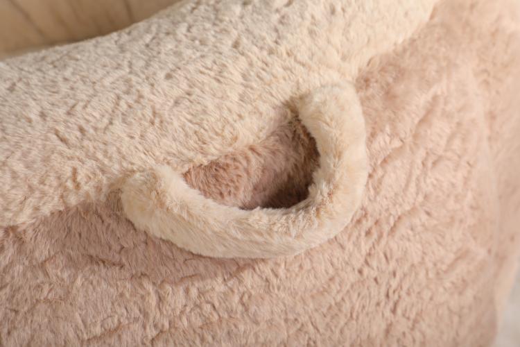 Oversized faux fur bean bag chair interior with stitched seam and oval cushion