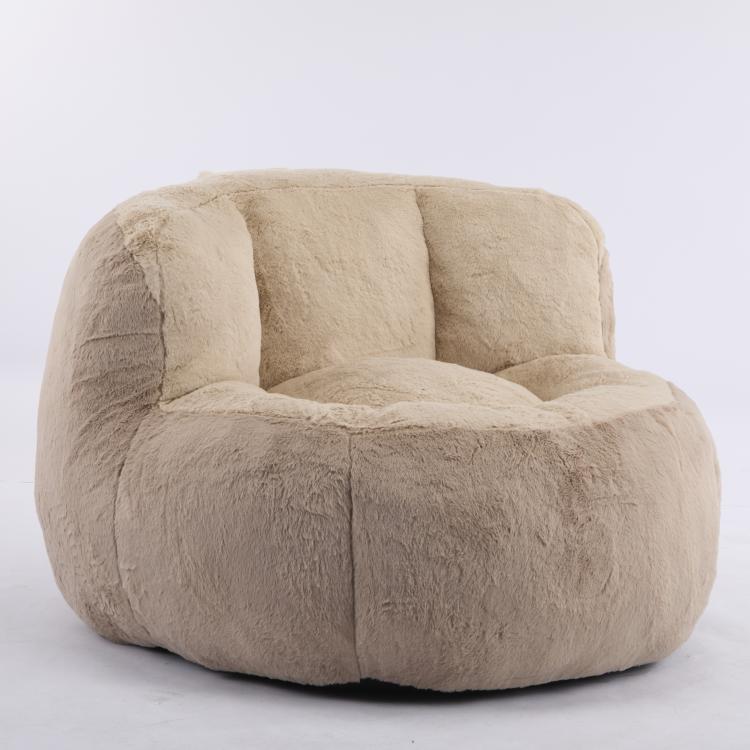 Oversized faux fur bean bag chair, tan side profile with recessed center seat