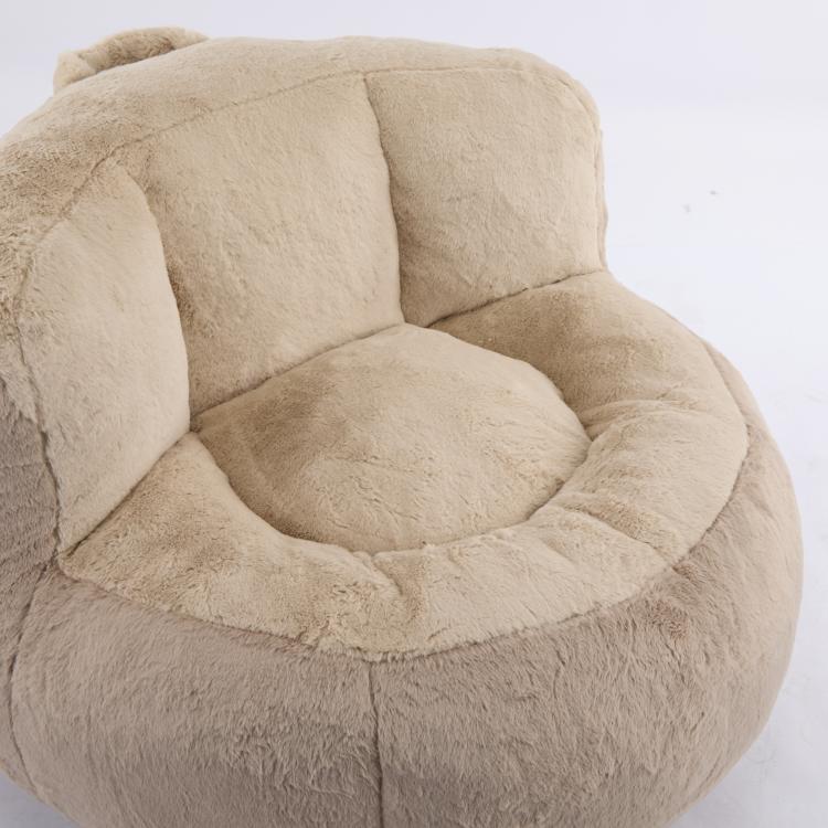 Oversized faux fur bean bag chair, tan curved seat and back support detail