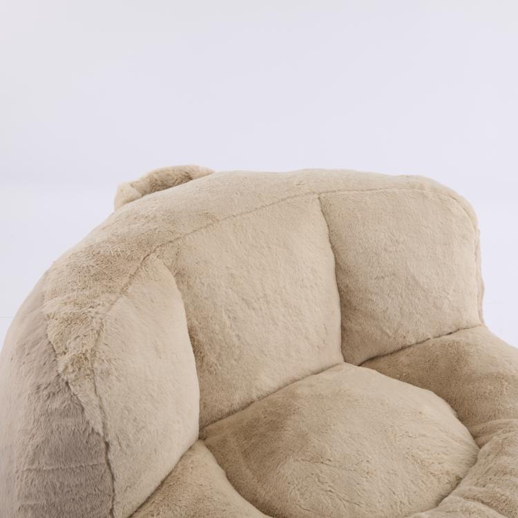 Oversized faux fur bean bag chair, tan top back panel and side arm close-up
