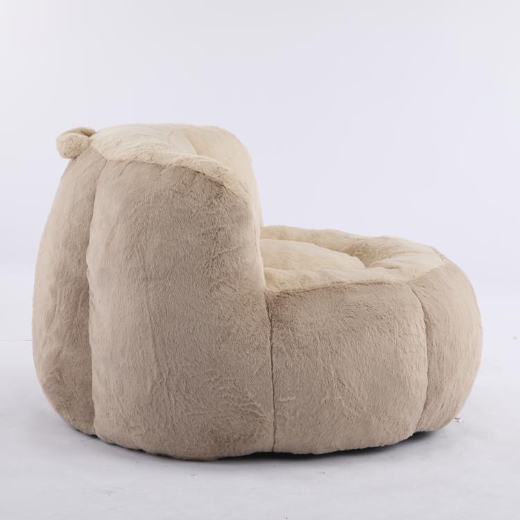 Faux fur bean bag chair with rounded backrest, light tan, wide seat