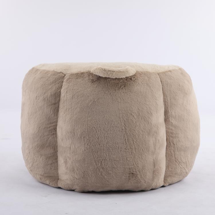 Faux fur bean bag chair with short back and armrests, light tan, boxy seat