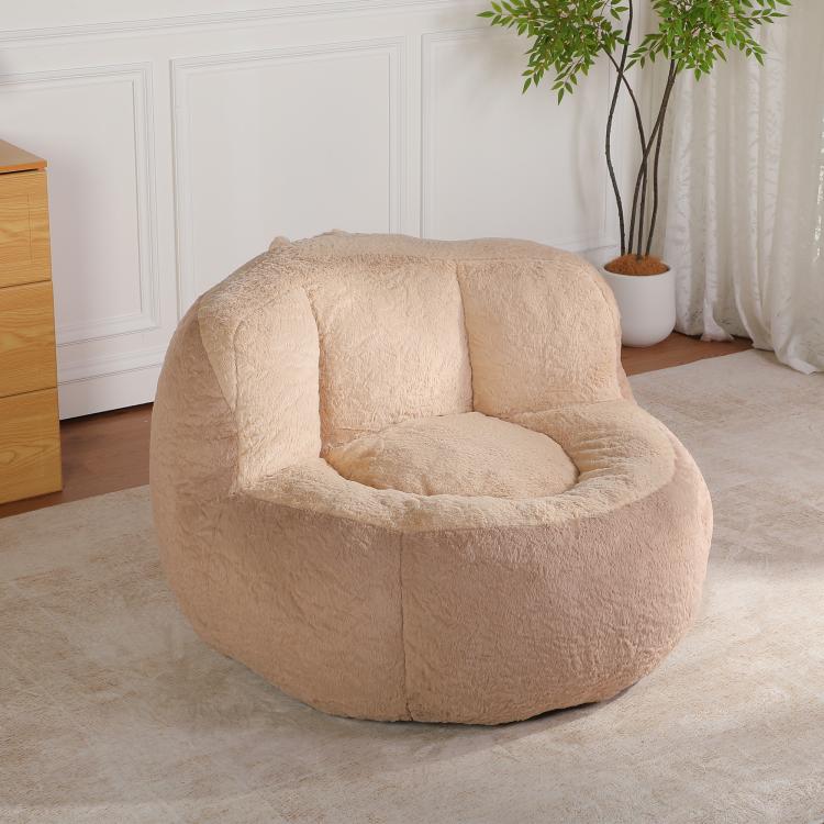 Beige faux fur bean bag chair with deep seat and curved side bolsters