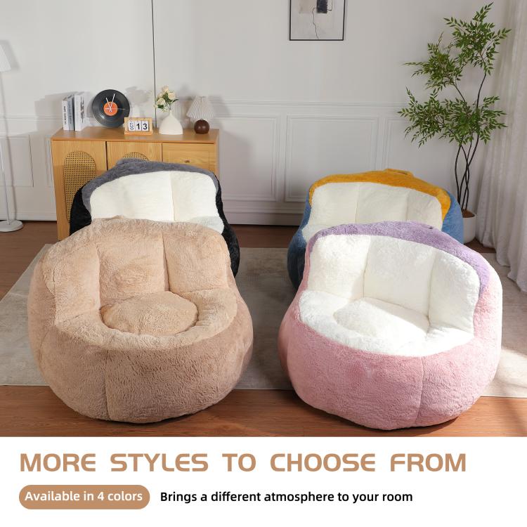Two bean bag chairs: beige tan chair and multicolor seat chair in room setting