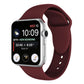 Double-rivet silicone watch band in wine red for Apple Watch 38mm, with perforated strap holes