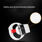 White magnetic wireless charger holding a smartwatch with red strap