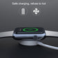 Magnetic wireless watch charger on watch strap with green charging indicator