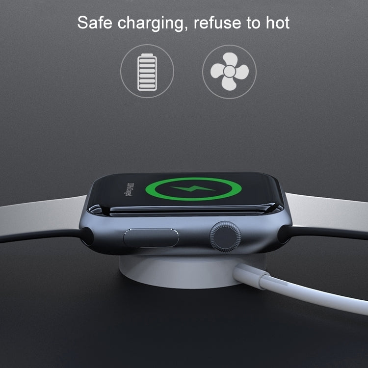 Magnetic wireless watch charger on watch strap with green charging indicator