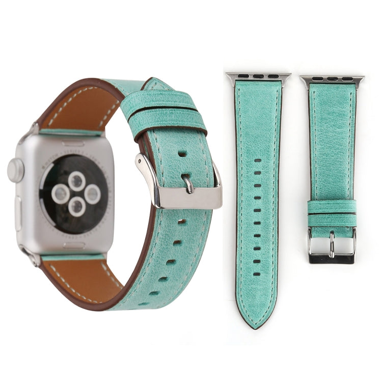 Genuine leather Apple Watch band, teal strap with brown underside and silver buckle hardware