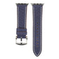 Dark blue denim-style watch band with silver buckle, contrast stitching, and perforation holes