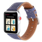 Blue woven watch band on a smartwatch, tan leather underside, silver buckle and stitching