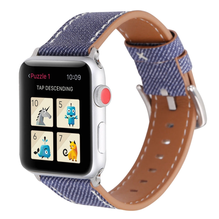 Blue woven watch band on a smartwatch, tan leather underside, silver buckle and stitching