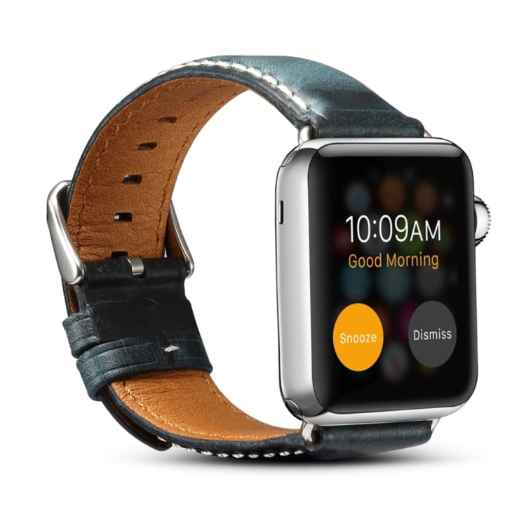 Dark blue leather watch band with metal buckle, perforated strap and stitched edges