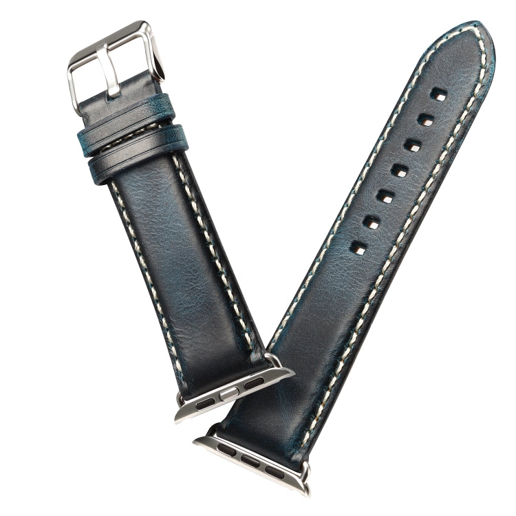 Dark blue leather watch band with metal clasp and white stitching, perforated holes