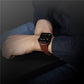 Apple Watch leather band on wrist, brown strap with silver buckle and stitched holes