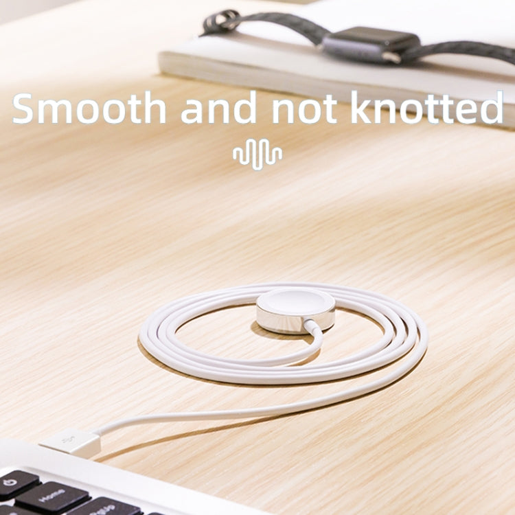 Coiled white magnetic charging cable with USB connector, smooth anti-knot design