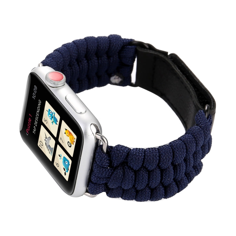Dark blue braided nylon Apple Watch band with black leather underside and silver hardware