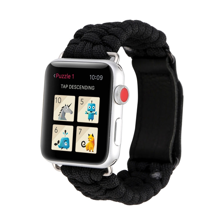 Black braided rope watch band with stainless buckle and black leather keeper, on watch