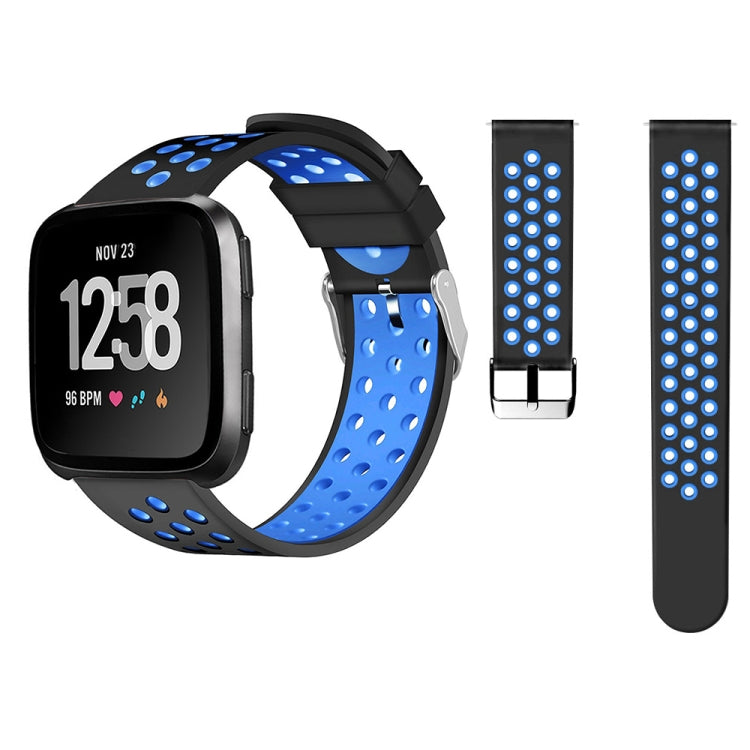 Blue silicone smartwatch band with perforations and black buckle for Fitbit Versa