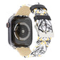 Leather watch band with black-and-yellow thorn print; silver clasp and strap detail