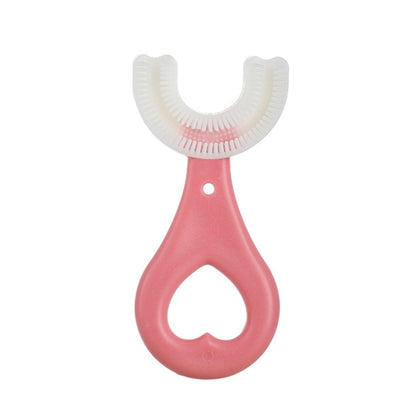 Pink U-shaped children’s toothbrush with soft heart-shaped bristle head