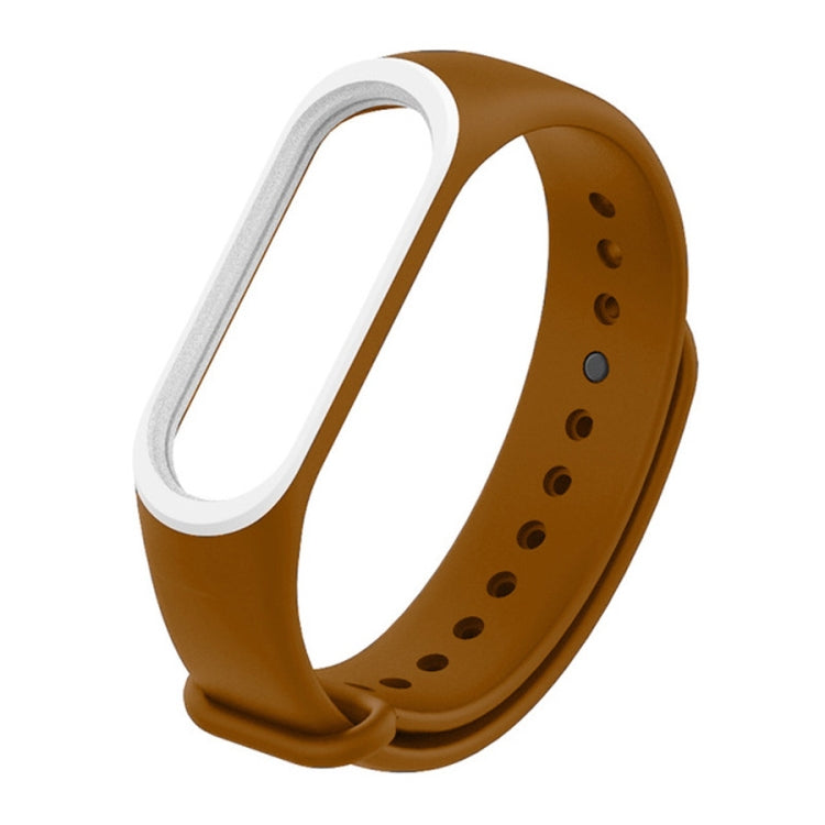 Brown silicone watch band with white inner loop and perforated strap holes