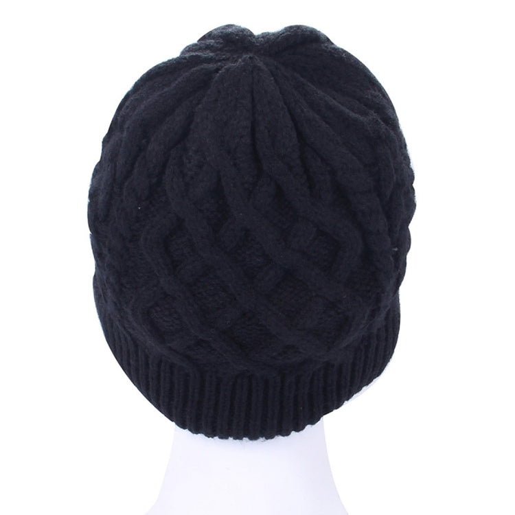 Black ribbed knit Bluetooth beanie hat top view with textured pattern