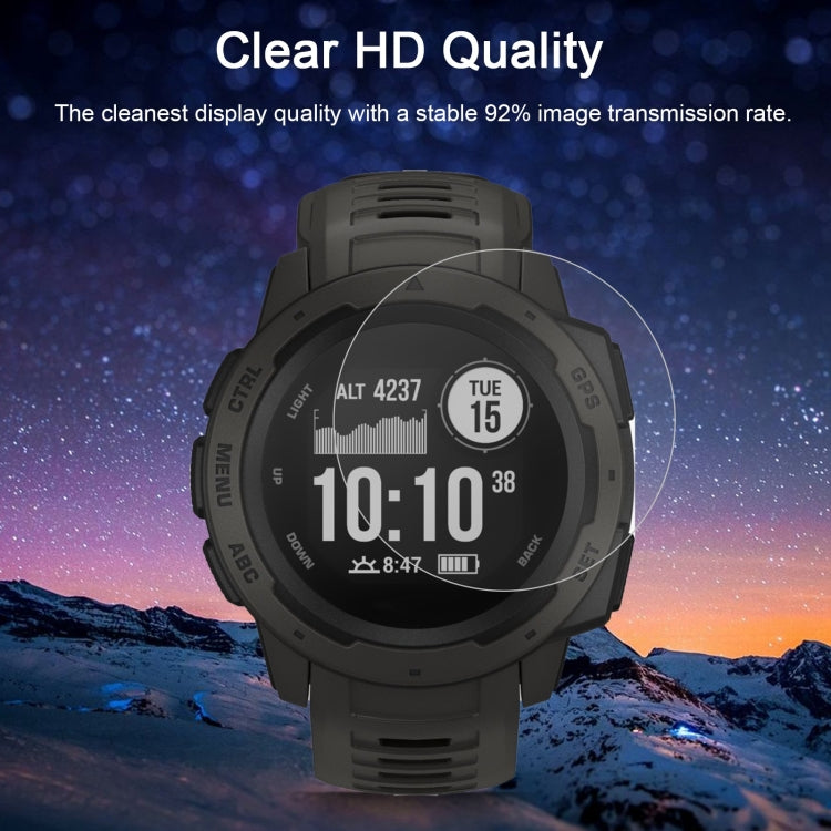 Curved tempered glass screen protector on dark smartwatch display, transparent film.