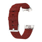 Dark red woven nylon watch band with metal clasp buckle, side view